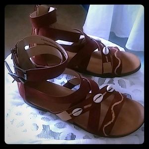 Brown gladiator sryled sandals